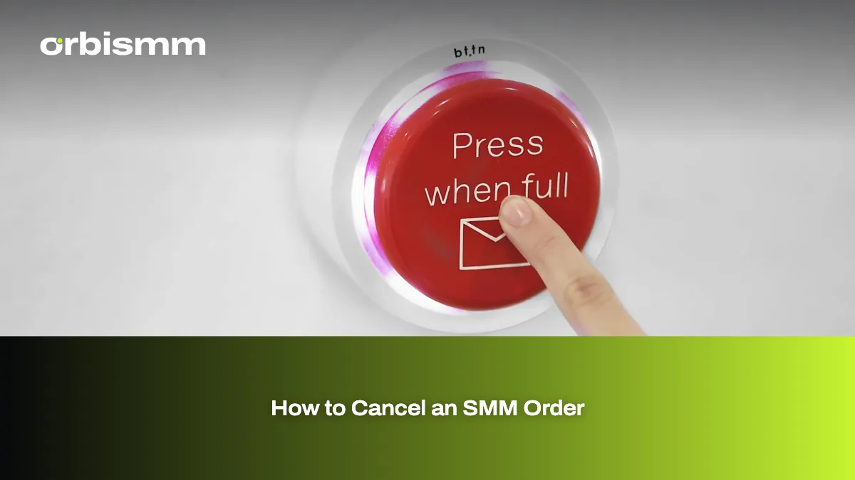 A finger pressing a round stop button on a control panel.